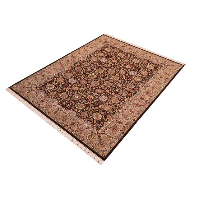 Designed with mesmerizing intricacy and gorgeous color palette, this hand-knotted masterpiece demonstrates the beauty and...