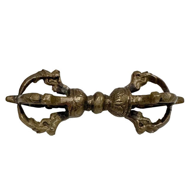 This is handcrafted Tibetan Brass Dharma Instrument. It is all hand made and used in practice Tibetan religious law. Look...