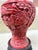 This is an antique Chinese Republic Era (1930’s) carved red cinnabar vase featuring intricate floral patterns on the neck...