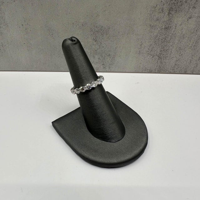 This stunning Natural Diamond Eternity Ring in 14kt white gold features 2.8ctw of natural GH SI round diamonds, creating a...