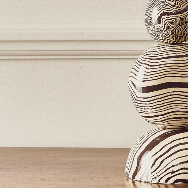 The Edison table lamp is elegant and refined, he takes up little real estate on your table, sideboard, or desk but he...