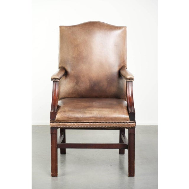 We are offering this 20th-century English-style Gainsborough desk chair/side chair in cowhide leather with a luxurious...