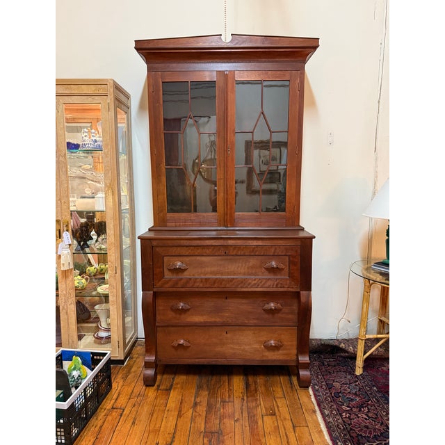 Antique Victorian mahogany and cherry secretary desk and bookcase. Case has two deep drawers with dovetail joints and one...