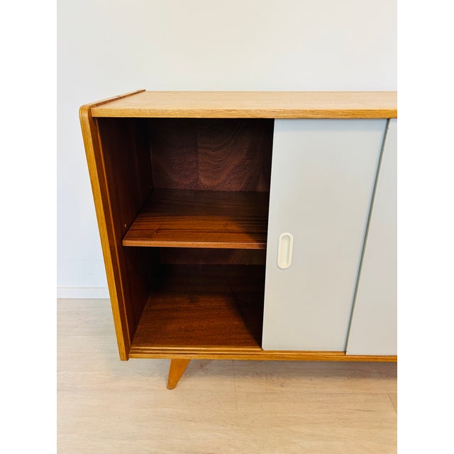 This vintage sideboard designed by famous Czech furniture architect Jiri Jiroutek have been carefully cleaned and restored...
