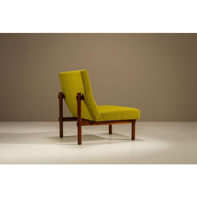 A chair with an architectural frame and a calm, low-slung posture, Model 869 reflects Ico Parisi’s interest in structure,...