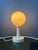 Beautiful mid-century table or bedside lamp featuring an elegant opaline glass shade. The softly diffused glass creates a...