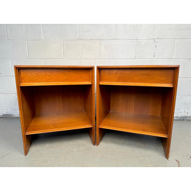 Exquisite Walnut Nightstands by T.H. Robsjohn-Gibbings for Widdicomb. Renowned for his mid-century modern designs, T.H....