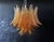 Beautiful Italian Murano Chandelier composed of 36 splendid amber glasses that give a very elegant look. The glasses of...