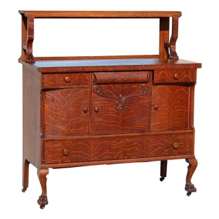 Antique Victorian Quarter-Sawn Tiger Oak Buffet Sideboard With Beveled Mirror and Lion Paw Feet on Casters For Sale