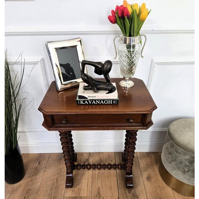 Beautiful Italian sewing table ideal as side or end table, characterized by typical beveled edges top with the central...