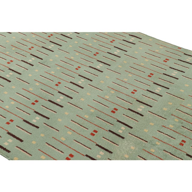 Hand-knotted in wool and originating from Turkey circa 1960 – 1970, this 5x8 vintage Zeki Müren rug is a unique addition...