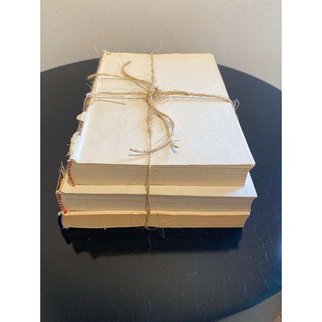 Elevate your home décor with this exquisitely curated stack of minimalist books, designed to bring a touch of timeless...