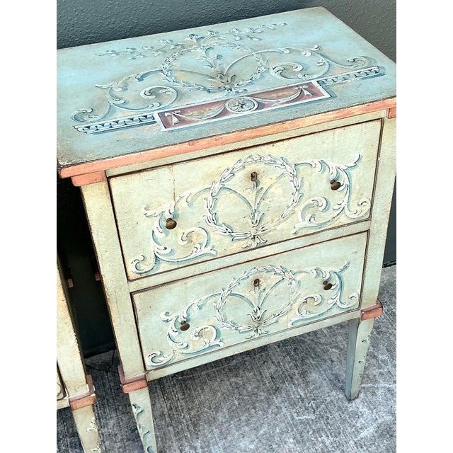 Elevate your bedroom or living space with this exquisite pair of Vintage Italian Regency nightstands. Dating from the...