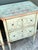 Elevate your bedroom or living space with this exquisite pair of Vintage Italian Regency nightstands. Dating from the...