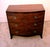 A fine george iii mahogany serpentine chest of drawers dating to around 1810, in the elegant sheraton style the chest...