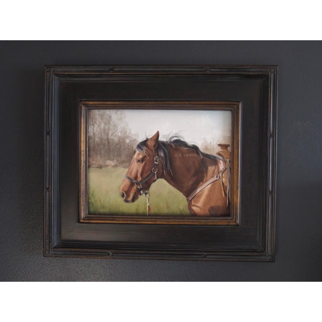 The artwork depicts a serene brown horse, its gentle gaze reflecting a sense of calm and companionship. The soft...