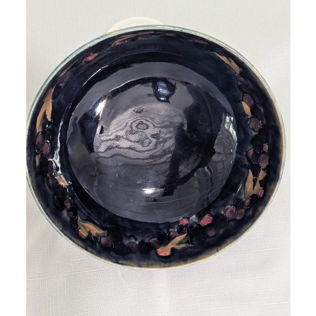 Signed Moorcroft Bowl with Apples is in new condition and has only been displayed on a shelf. The discontinued pattern has...