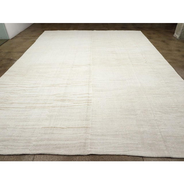 A vintage Turkish flatweave Kilim oversize carpet handmade during the Mid-20th Century. Measures: 14' 5" x 19' 9".