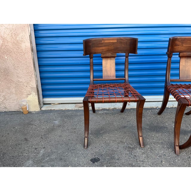 Klismos modern walnut chair. Chair is made of solid walnut and have a natural walnut finish. Chair is in beautiful...