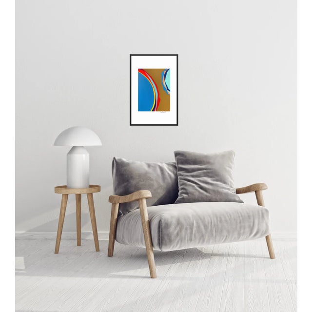 This striking abstract print by Bryan Boomershine Art features bold, overlapping arcs of vivid coloR set against a warm...