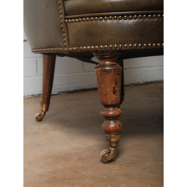 Mid 20th Century Pair of Vintage Tufted Leather Club Chairs With Brass Casters and Turned Legs For Sale - Image 5 of 6