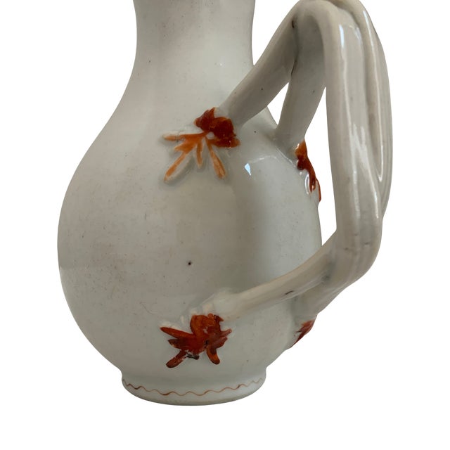 A distinctive late 18th-century Chinese export porcelain cream jug, circa 1770–1800, featuring an unusually sculptural...