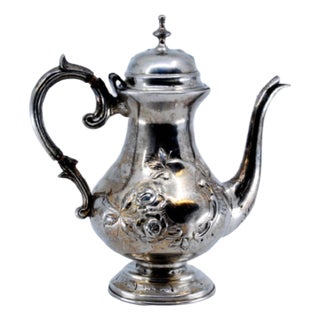 Coffee Pot in Embossed Silver with Floral Motifs For Sale