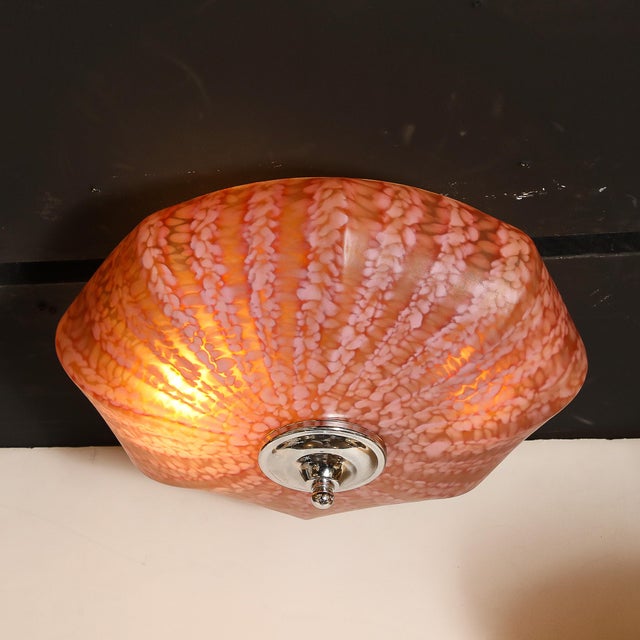 Introduce a touch of vintage elegance to your space with this Mid-Century Murano Glass Pendant Chandelier in Sakura Pink...