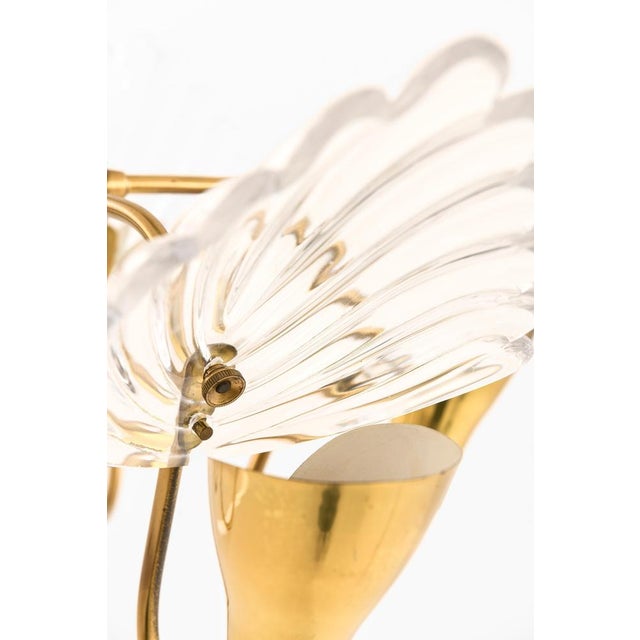 This ceiling lamp, designed by carl fagerlund and produced by orrefors in sweden during the 1950s, is a stunning example...