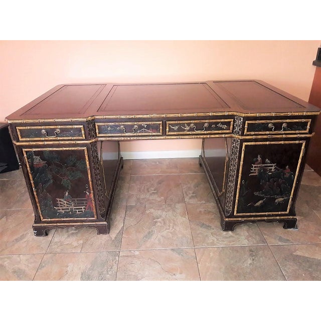 High Quality Vintage Chinoiserie Lacquered Leather Top Partner's Writing Desk with Drawers and Cabinet Storage is in clean...