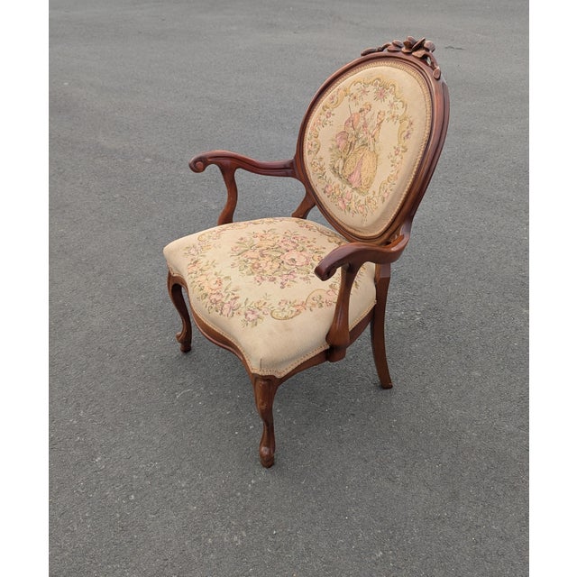 Vintage Louis XVI style arm chair, walnut frame , floral needlepoint upholstery