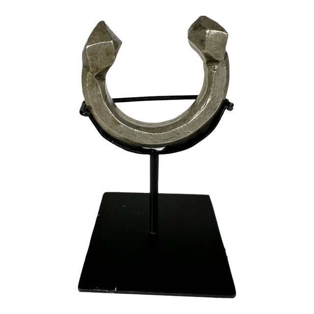Mid 20th Century African Currency Bracelet on Custom Stand For Sale
