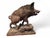 Rare and highly decorative 19th-century carved wooden sculpture representing a warthog, executed in solid wood with...