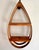 Beautiful midcentury Danish Modern bentwood hanging shelf with strips of teak in a teardrop shape holding two shelves of...