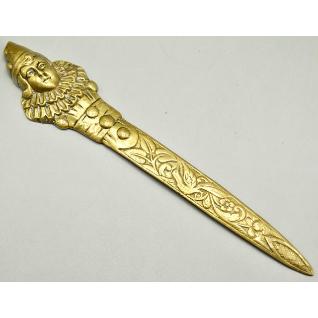 Antique English brass pierrot paper knife / letter opener. It is a solid brass, circa 1930's era pierrot handcrafted with...