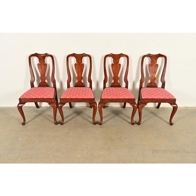 An outstanding set of four Queen Anne or Georgian style dining chairs By Henkel Harris USA, Circa 1970s Solid cherry wood...