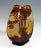 Vase in the shape of a drum on an oval, short base, slightly tapering towards the top in depth, at the top as an opening...