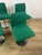 Set of 4 chairs with a steel frame, seat and backrest upholstered in green fabric, made in Italy in the 1970s. The chairs...