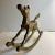 Charming vintage solid brass rocking horse for a child's room or nursery shelf.