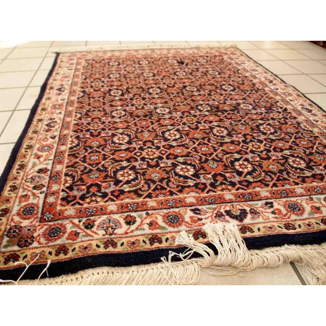 Handmade vintage Indo-Tabriz rug in wool. The rug is from the end of 20th century in original good condition. ​-condition:...