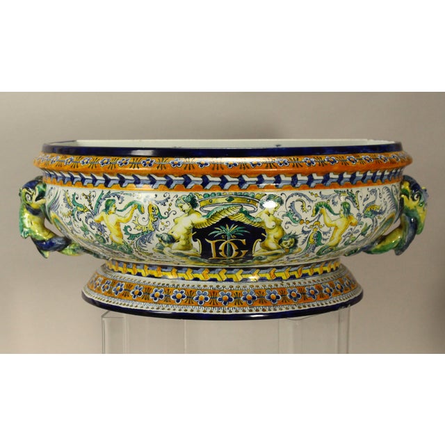 A stunning lavabo set, made by the prominent French faience factory in Gien A wall fountain and a basin made of fine...
