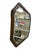 A vintage Art Deco-era mirror imported from the United Kingdom, featuring a distinctive octagonal silhouette and a richly...