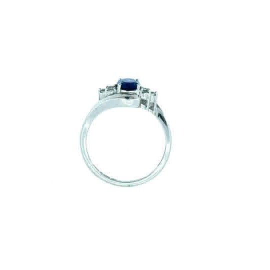 This sophisticated bypass-style ring features a stunning oval-cut blue cubic zirconia as its centerpiece, beautifully...