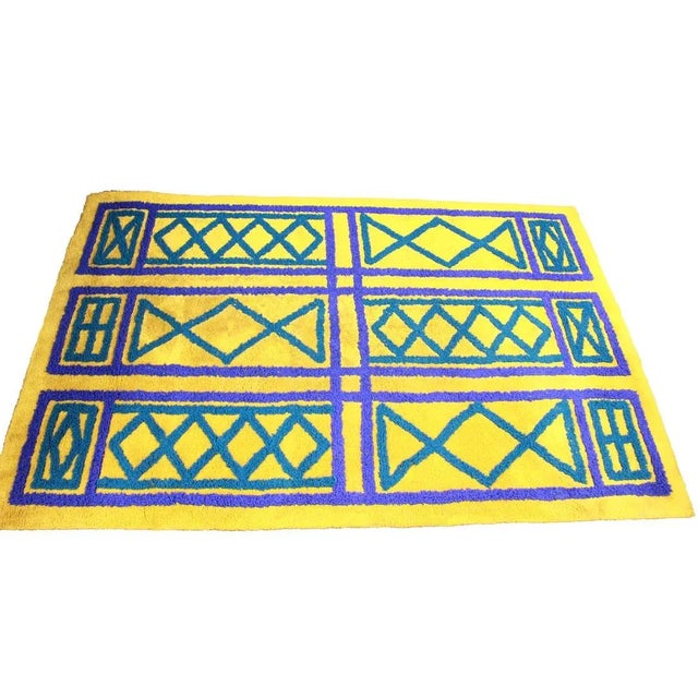 This beautiful vintage rug comes to you with a vibrant combination of colors. The citrusy green is the perfect complement...