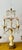 Stunning electrified candelabra/table lamp. Features four lights, many glass crystals, and beautiful pale yellow...