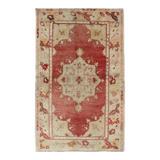 Mid 20th Century Red Field Vintage Turkish Oushak Rug With Geometric Medallion and Floral Motifs For Sale