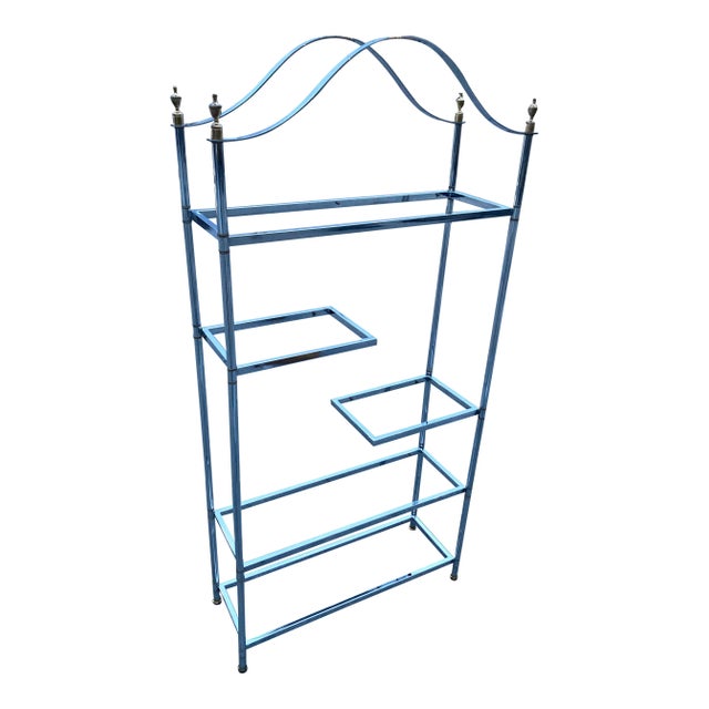 Heavy high quality vintage étagére in polished steel and brass with glass shelving, manner of Maison Jansen or...