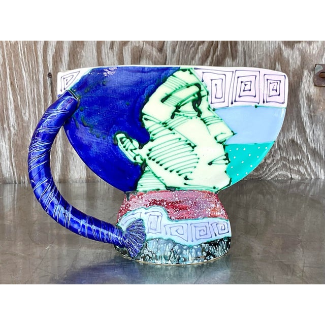 A fabulous vintage Boho glazed ceramic vessel. Chic hand painted detail in brilliant clear colors. Acquired from a Palm...