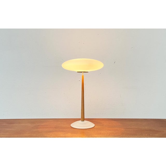 The large T2 table lamp version from the Pao lighting series by Matteo Thun. This is a rare version with a stem in light...