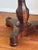 Antique Continental Art Deco carved and marquetry rosewood end table. This oval design is supported by a fluted and...